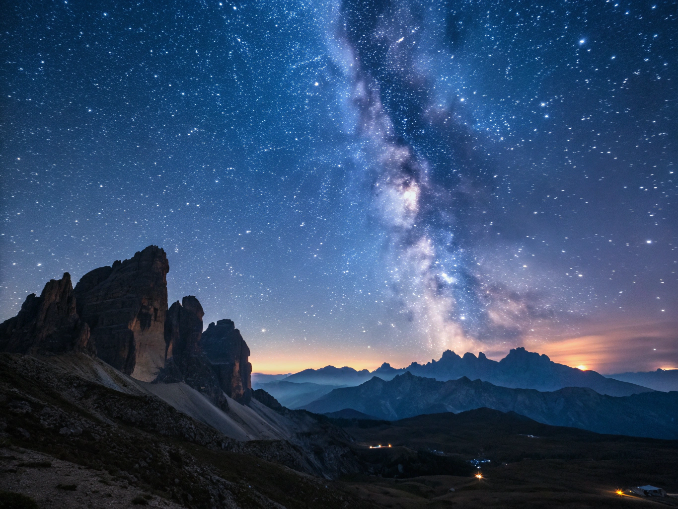 Wide field panorama of the Milky Way core over a mountain range